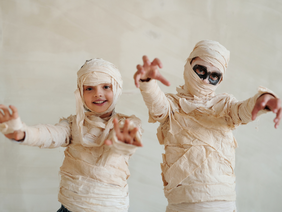 Kids dressed as mummies