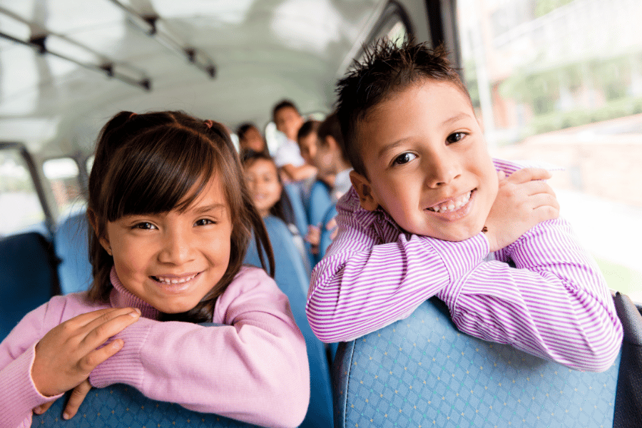 Kids riding the bus to school